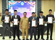 Wabup Jumarding Lantik Tim Hukum Pemkab Kolut