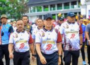 Gubernur Sultra Pimpin Jalan Sehat HUT Bhayangkara ke-79, Tekankan Sinergi Polri dan Masyarakat